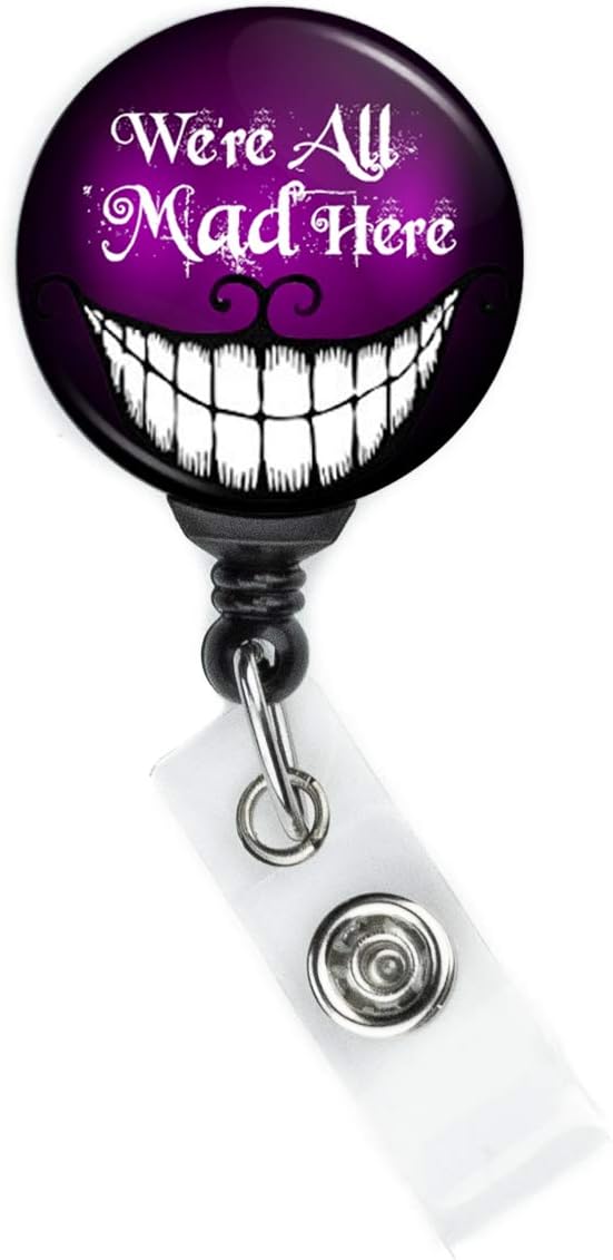 We're All Mad Here badge reel with retractable cord and swing clip
