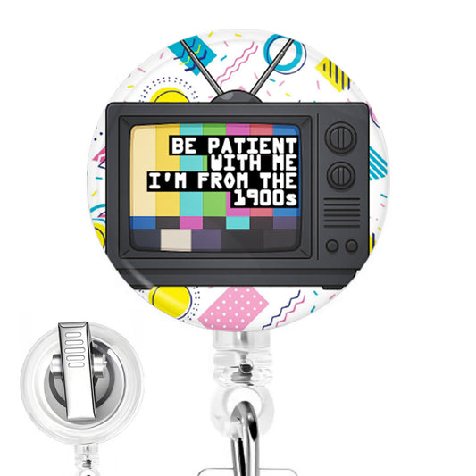 Be Patient with Me, I'm from the 1900s handmade button-top badge reel on a clear retractable reel