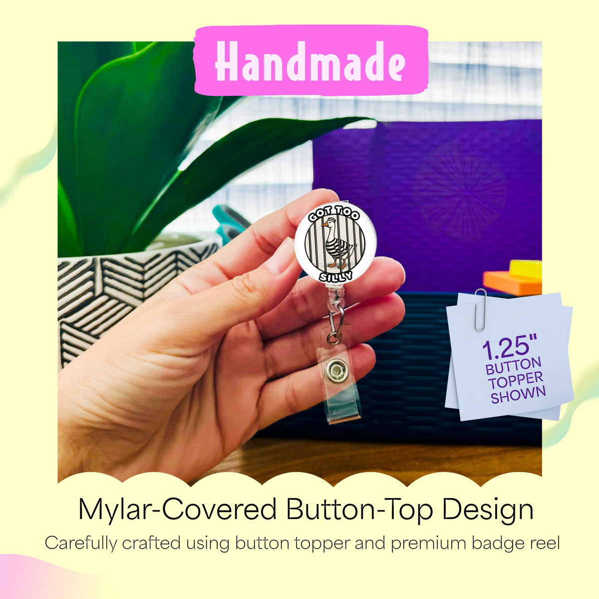 Hand holding the Silly Goose Got Too Silly handmade badge reel