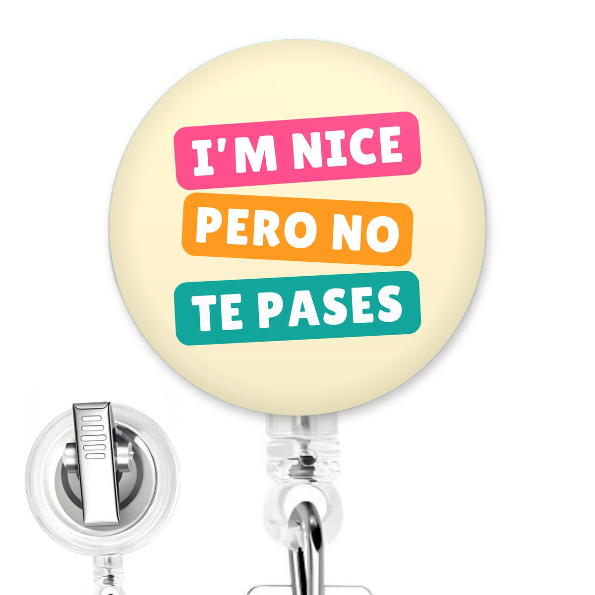 I'm Nice Pero No Te Pases handmade button-top badge reel on a clear retractable reel