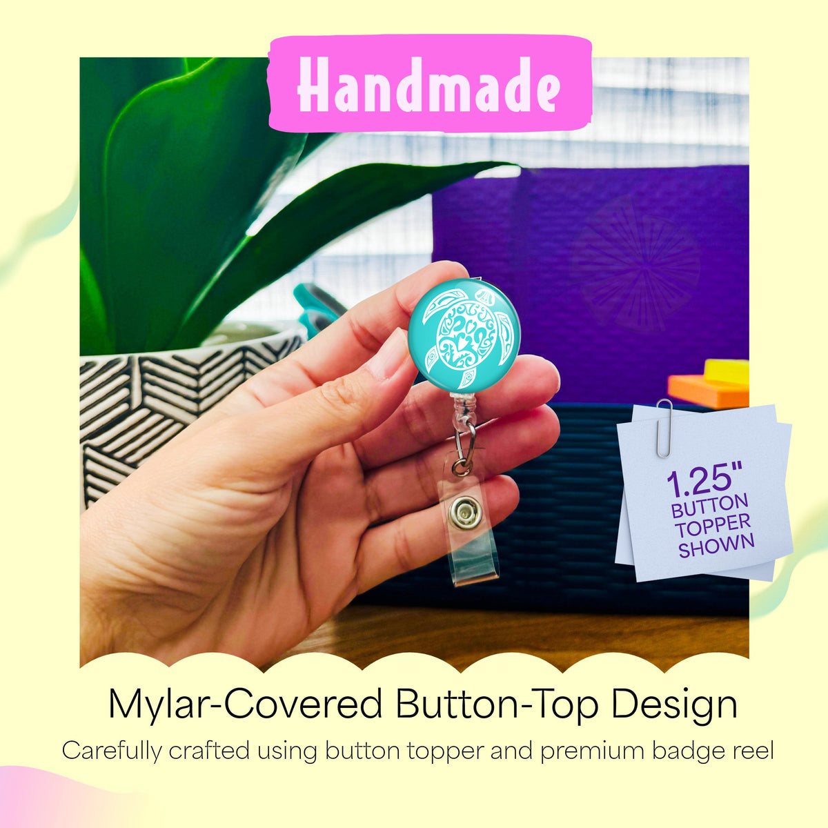 Hand holding the Tribal Turtle handmade badge reel